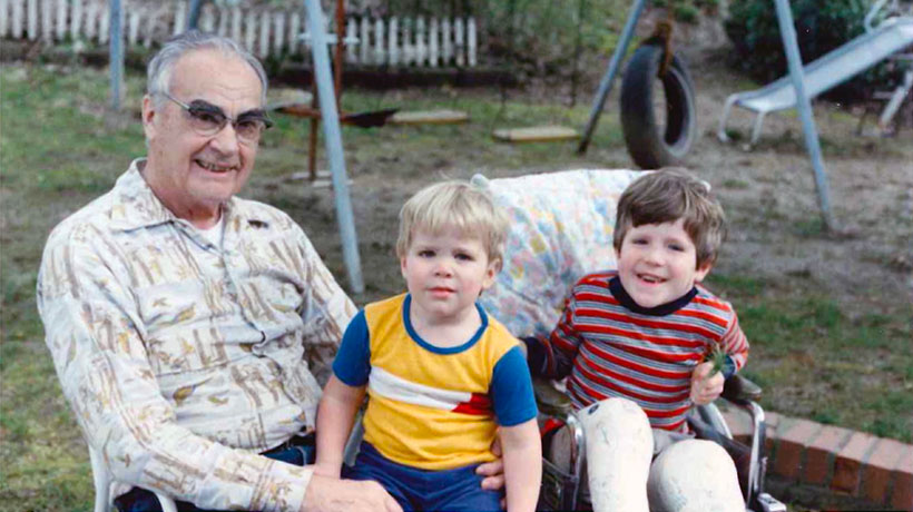 A grandfather and his two grandchildren